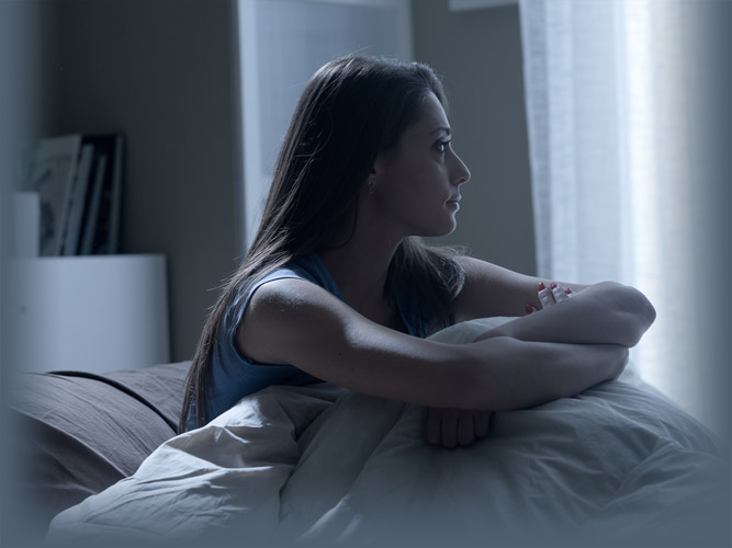 Sleep-Deprived Woman Looking Out Window